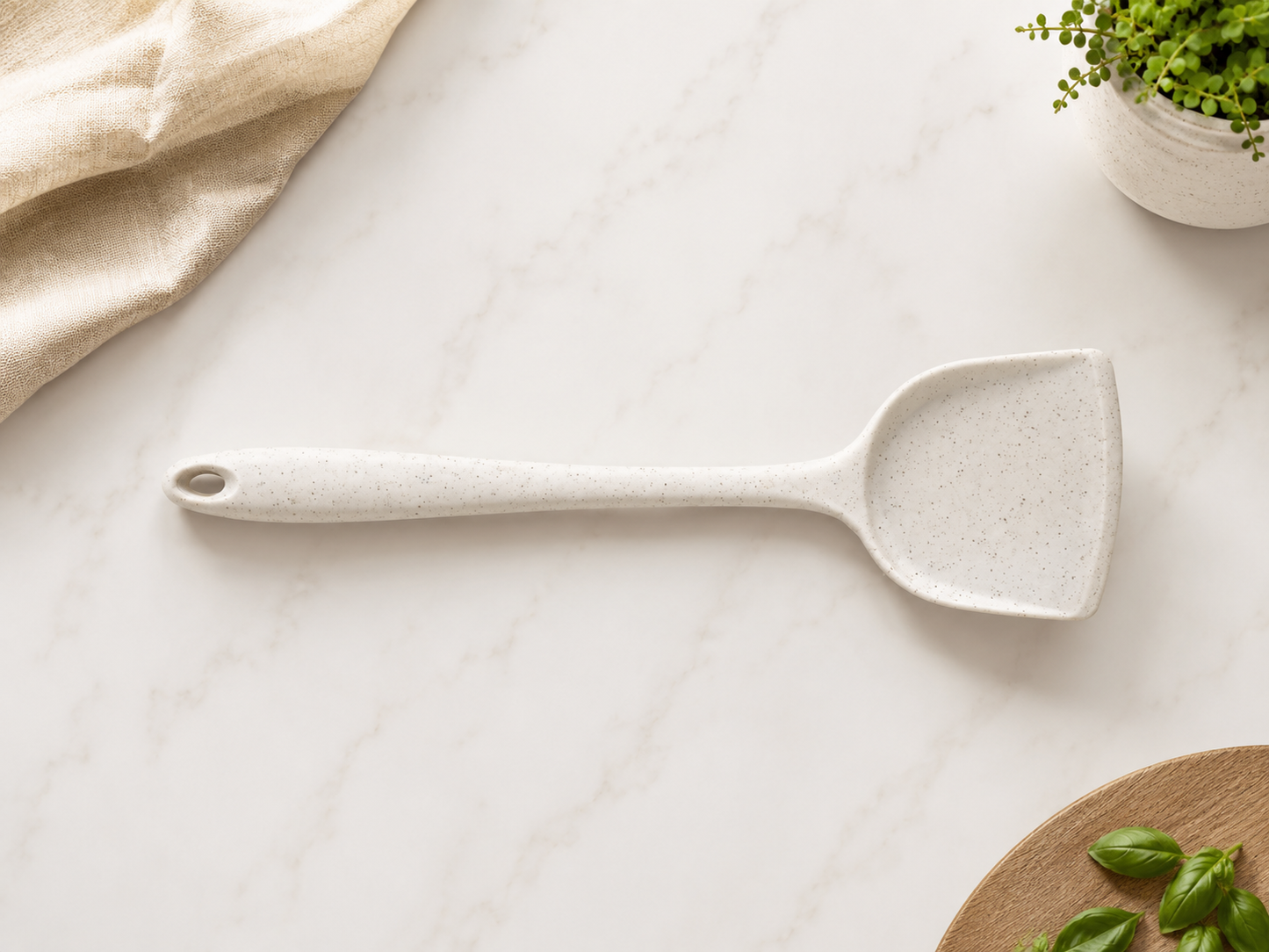 Cream speckled silicone spatula