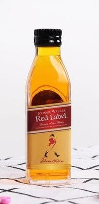 Red label miniature bottle of cake deco