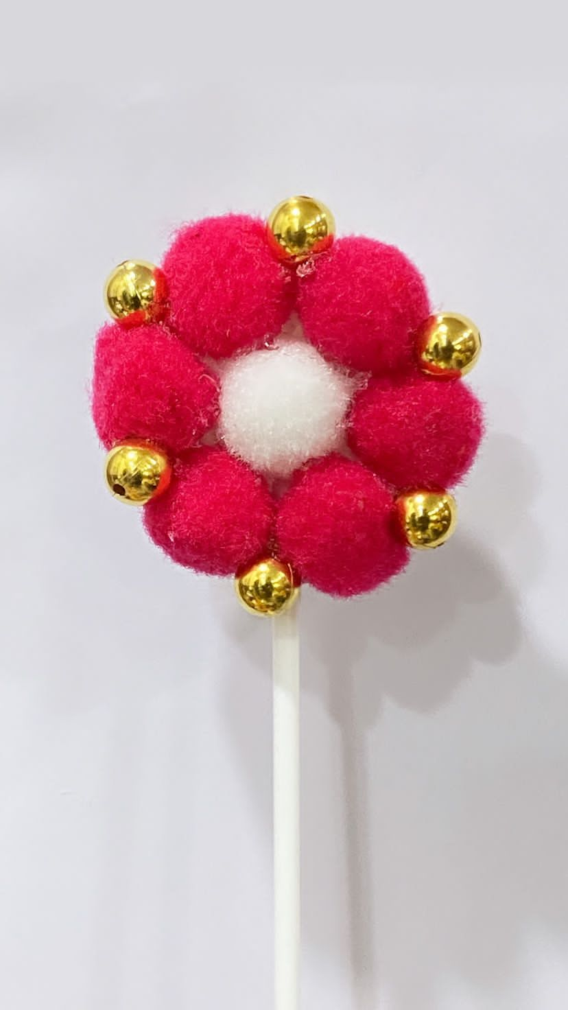 Pom pom cake topper