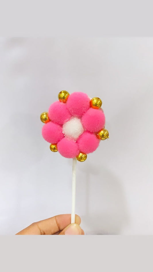 Pom pom cake topper