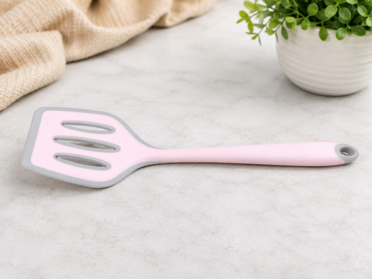 Pink silicone slotted turner spatula